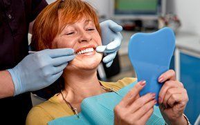 female patient at dentist