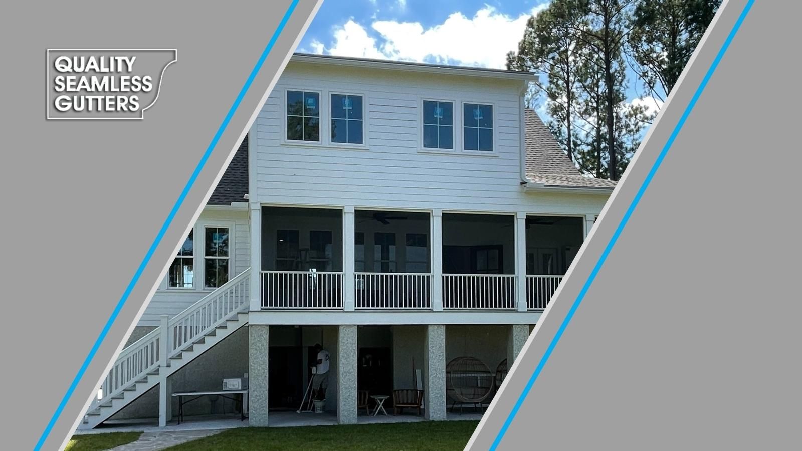 The back of a white house with a porch and stairs next to rain gutters.