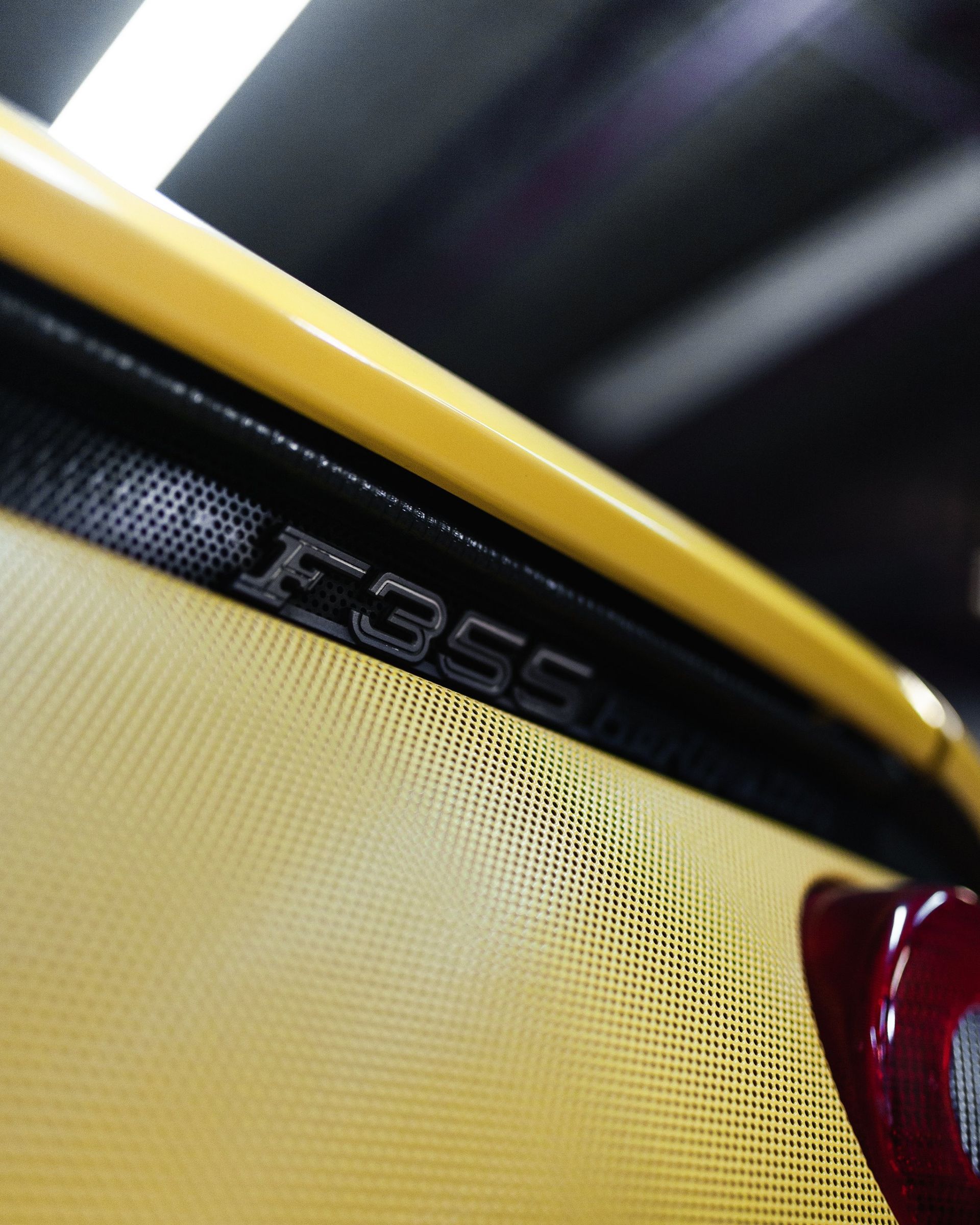 A close up of the back of a ferrari f355