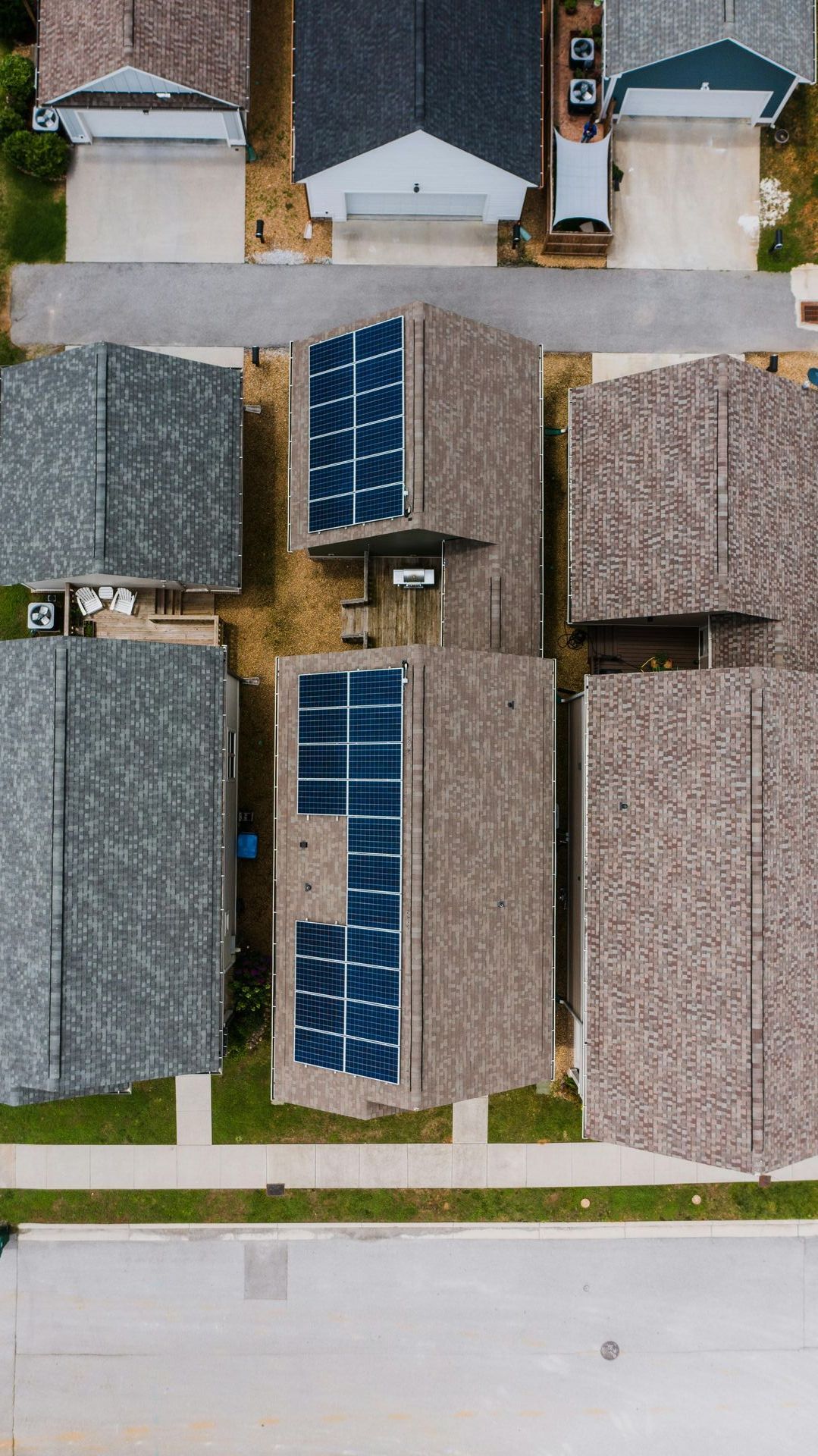 Aerial view of Pensacola roofs coated with white reflective silicone