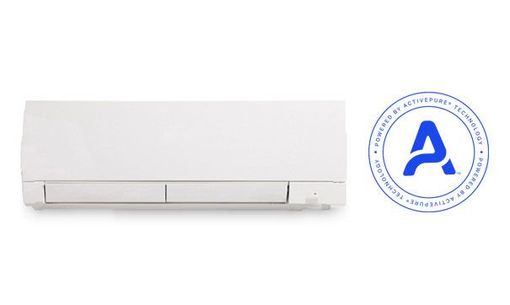 A white wall-mounted air conditioner unit next to a blue 