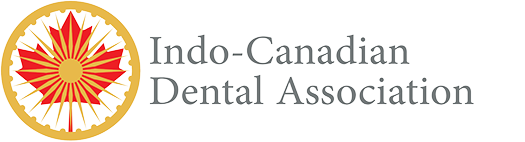 The logo for the indo-canadian dental association has a maple leaf in the center.