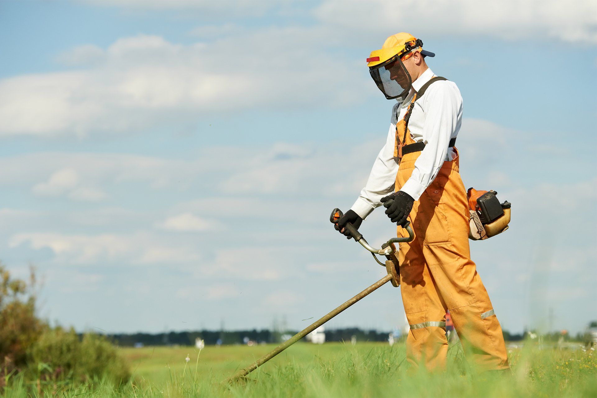 Man Cutting Grass