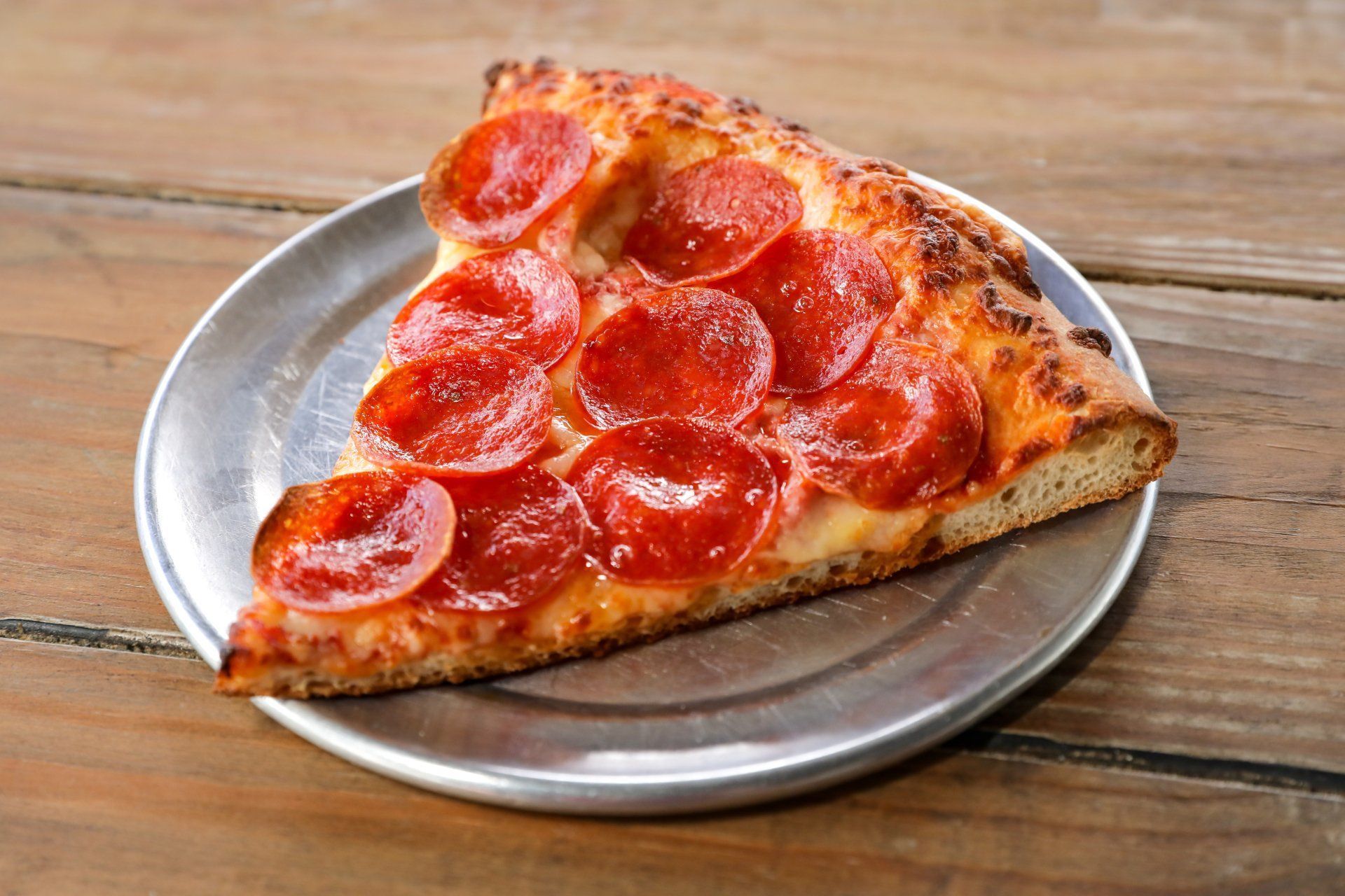 Slice of pepperoni pizza — Macon, GA — Ingelside Village Pizza
