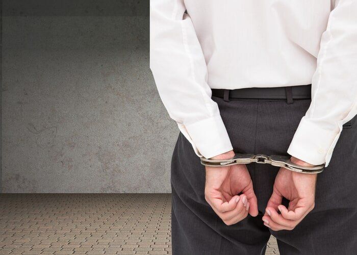 Man wearing handcuffs - Criminal Attorney in Champaign - Urban, IL