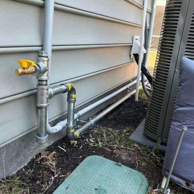Black River Plumbing & Gas - A. O. Smith water heater in a utility closet.