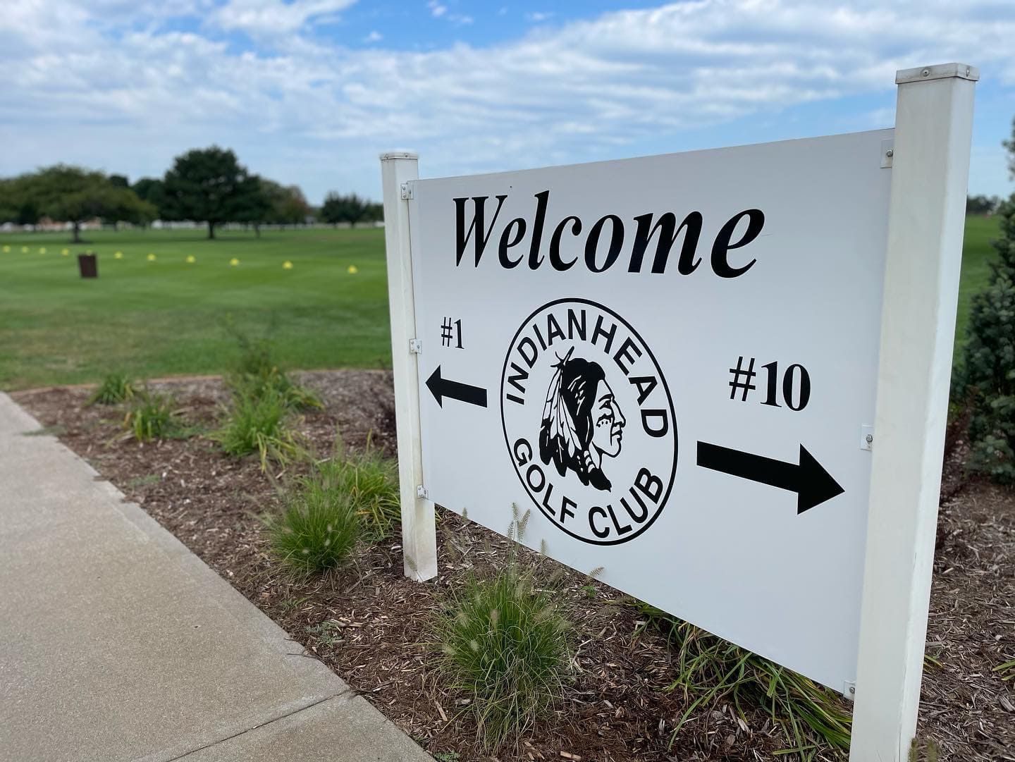 A welcome sign for the indianhead golf club