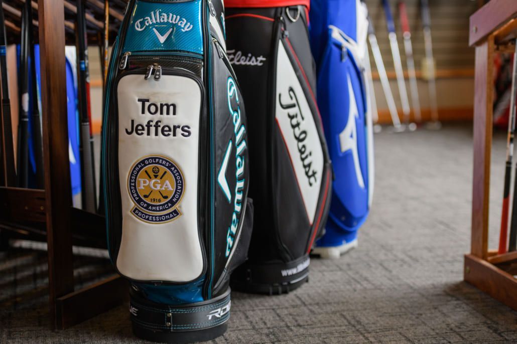 A golf bag with the name tom jeffers on it