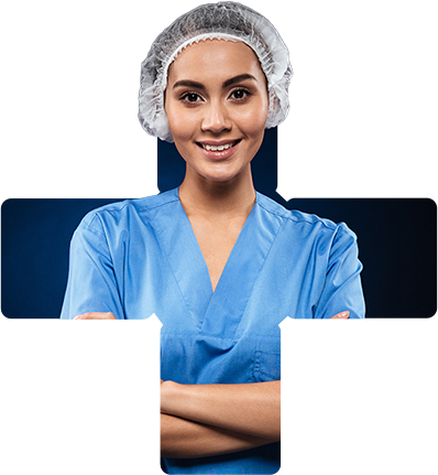 A female surgeon is standing with her arms crossed in front of a cross.