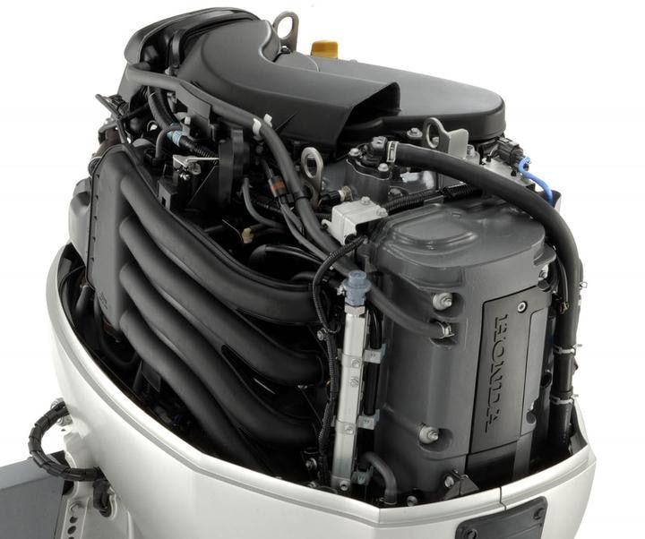 Close-up of a Silver Outboard Boat Motor With Black Components — Reef 2 River Marine in Proserpine, QLD