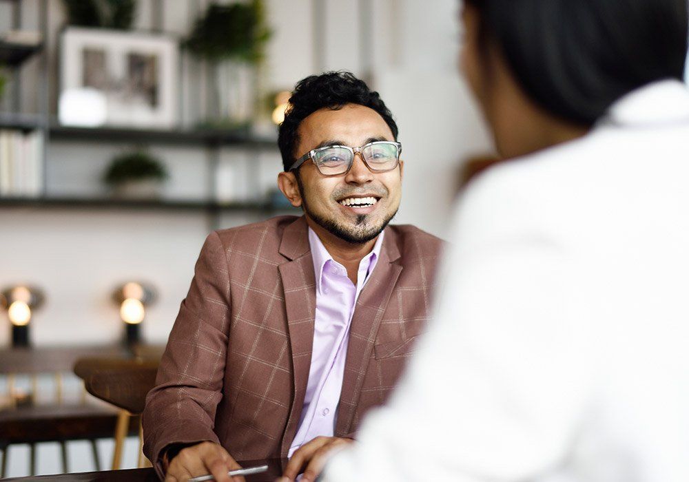 Man Talking To Client — Milwaukee, WI — The Parenting Network