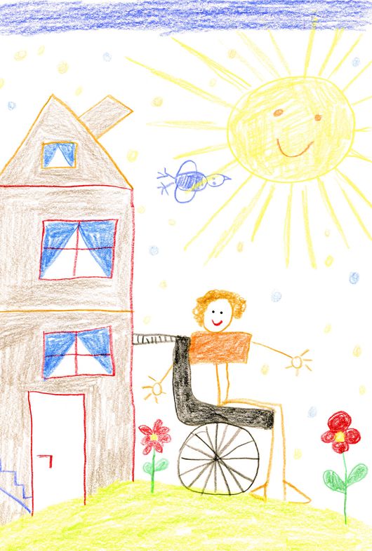 Disegno di un bambino che raffigura una persona su una sedia a rotelle