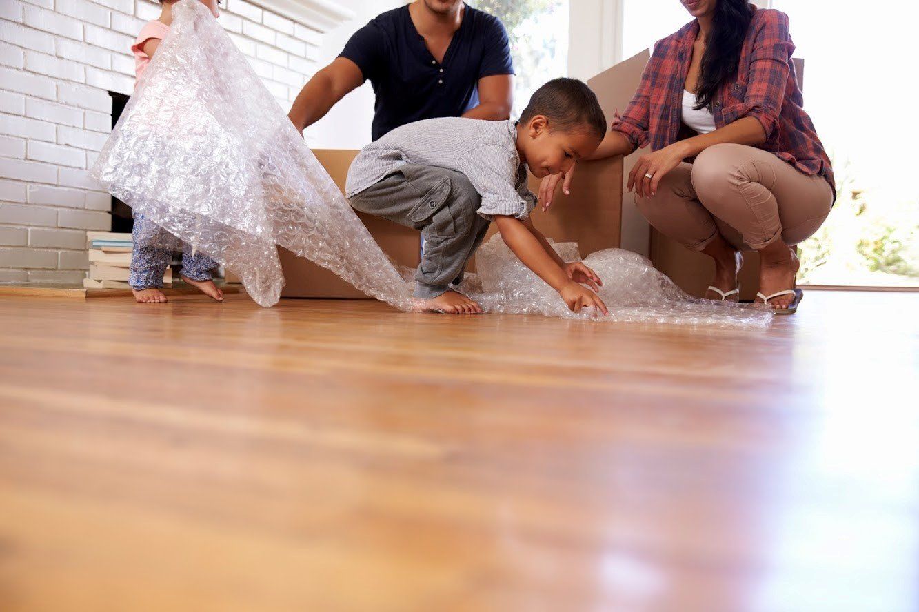 Kids Playing With Bubble Wrap — in Costa Mesa, CA — Secure One Capital