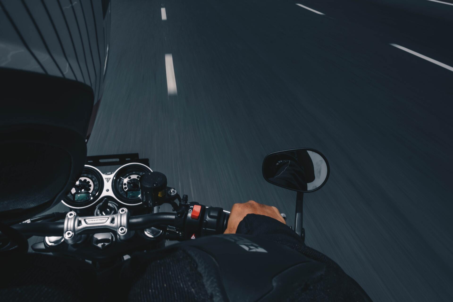 man driving a motorcycle