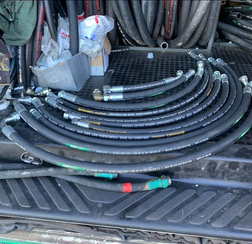 A Bunch Of Hoses Are Stacked On Top Of Each Other — Hosemobile In Kariong, NSW