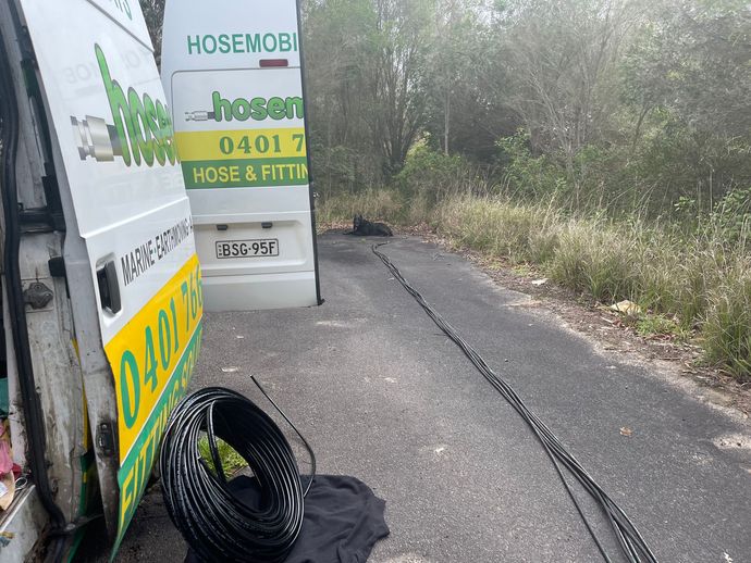 A White Van With The Word Hosemobile On It — Hosemobile In Kariong, NSW