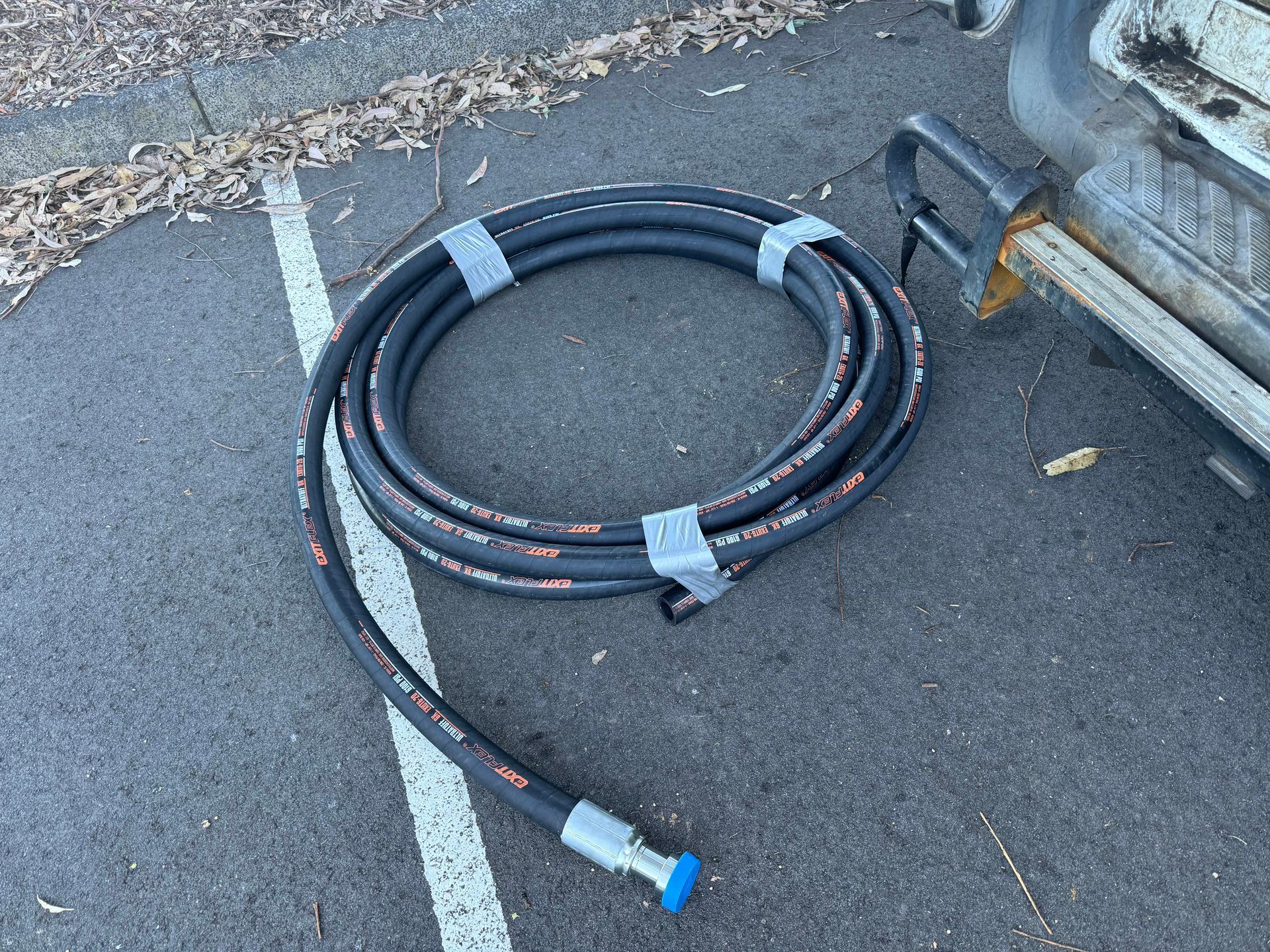 A Close Up Of Hydraulic Hoses And Valves On A Machine — Hosemobile In Tuggerah, NSW
