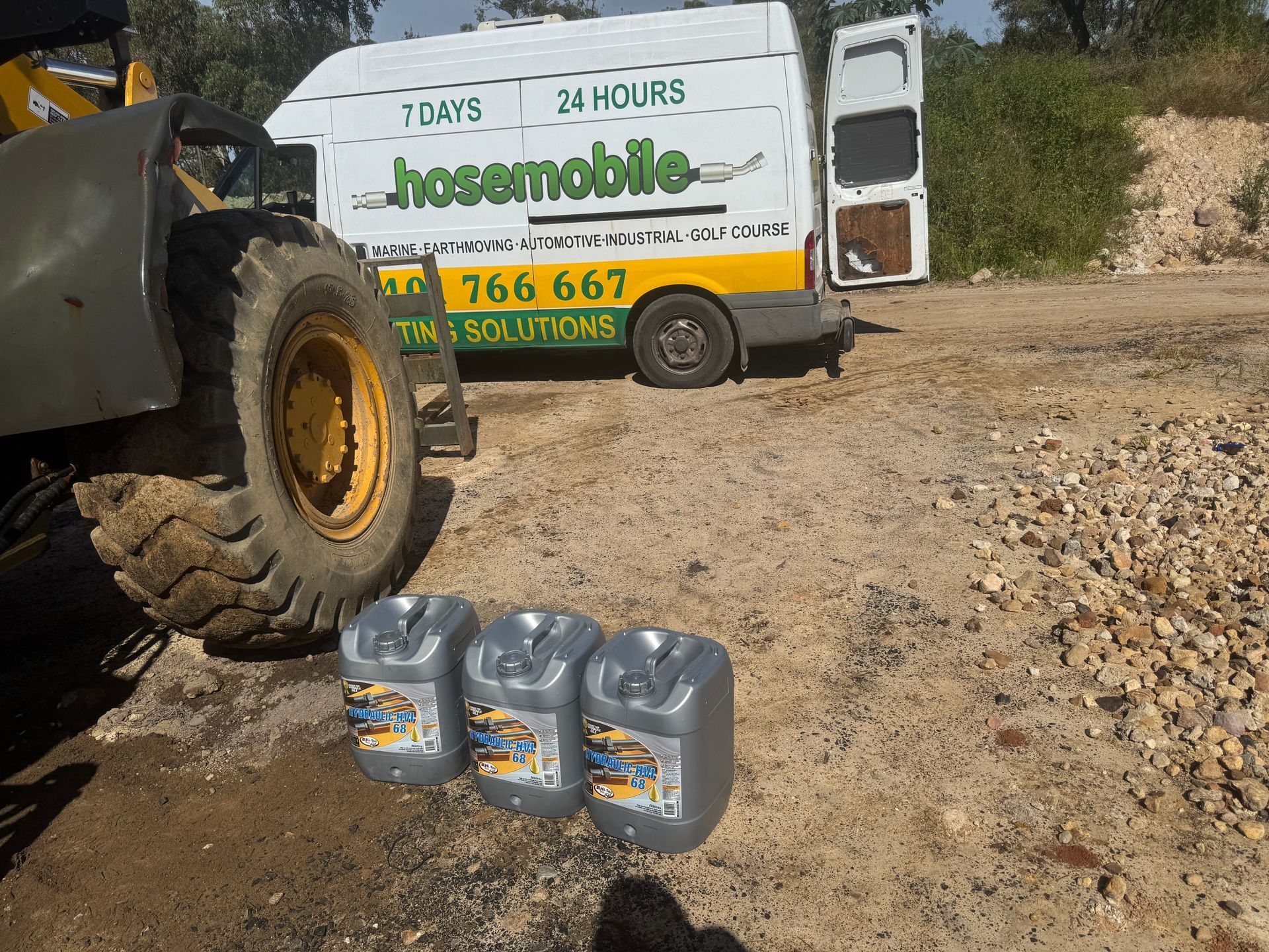 A hosemobile van is parked next to a tractor — Hosemobile In Kariong, NSW