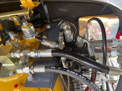 A Bunch Of Hydraulic Hoses Are Attached To A Machine — Hosemobile In Kariong, NSW