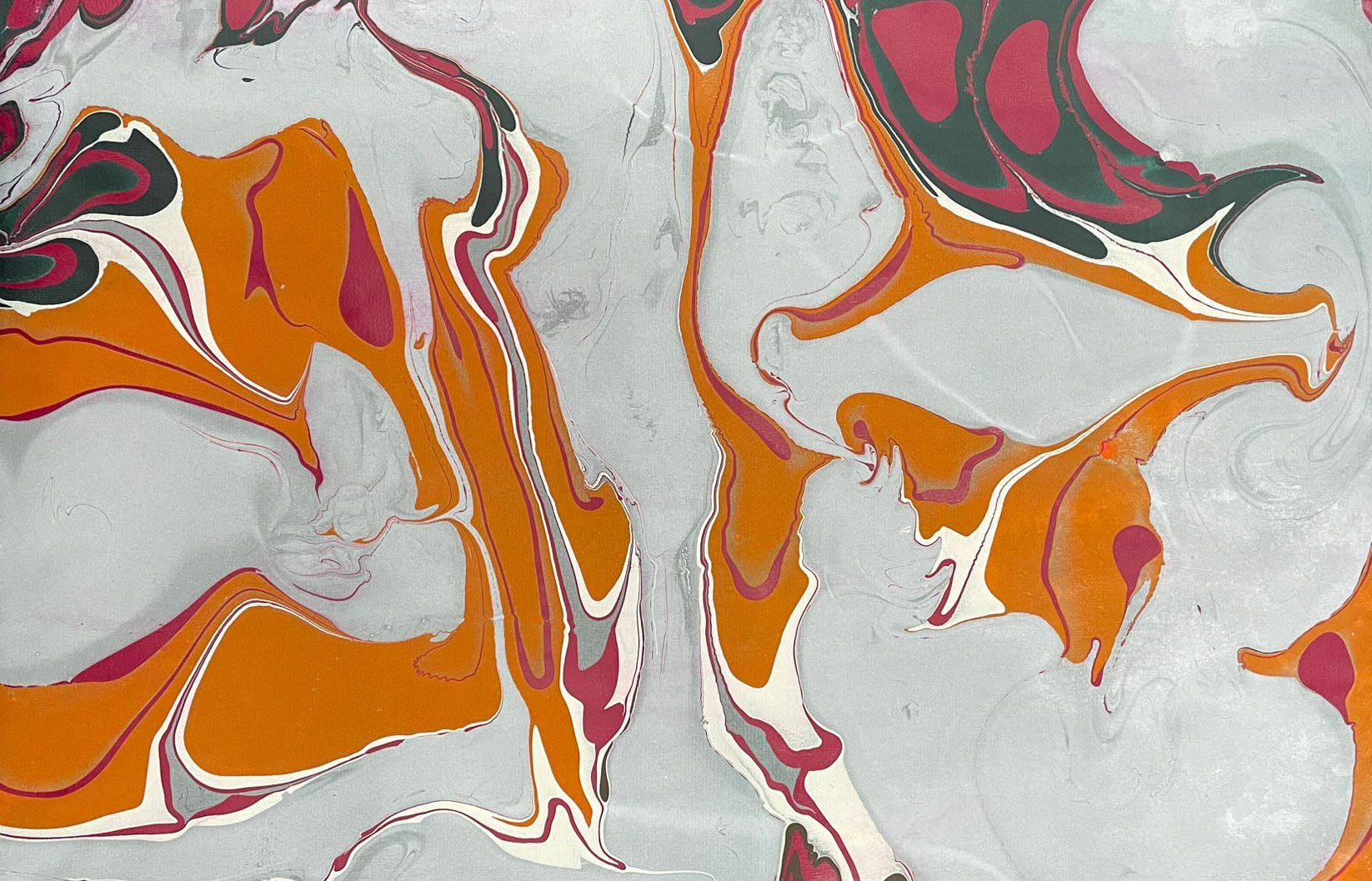 Organic design in freeflowing stylus work with marbled paper.
