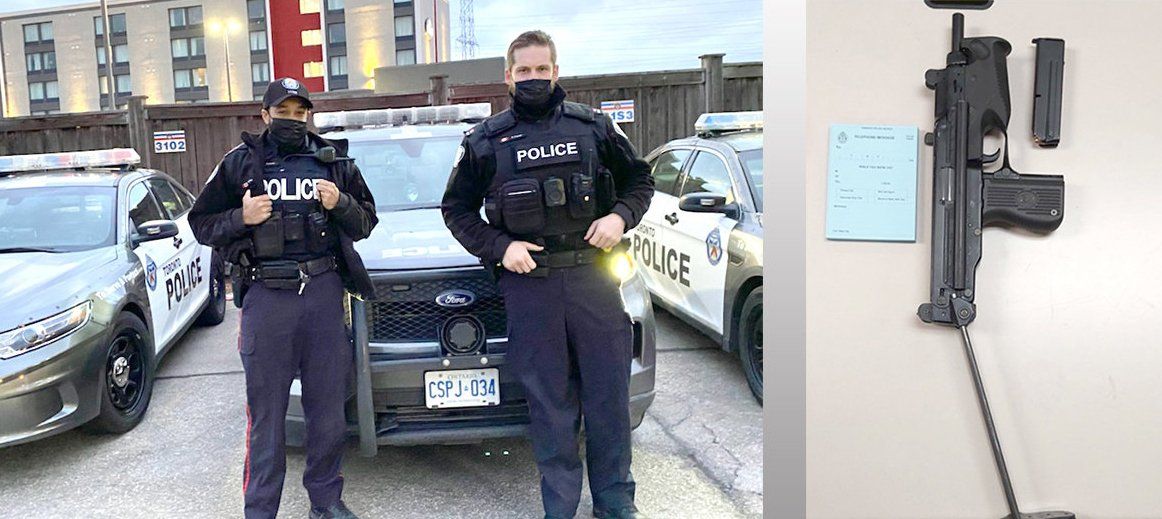 Constables Nathan Duke and Christopher Frazer with the firearm they seized Constables Nathan Duke and Christopher Frazer with the firearm they seized