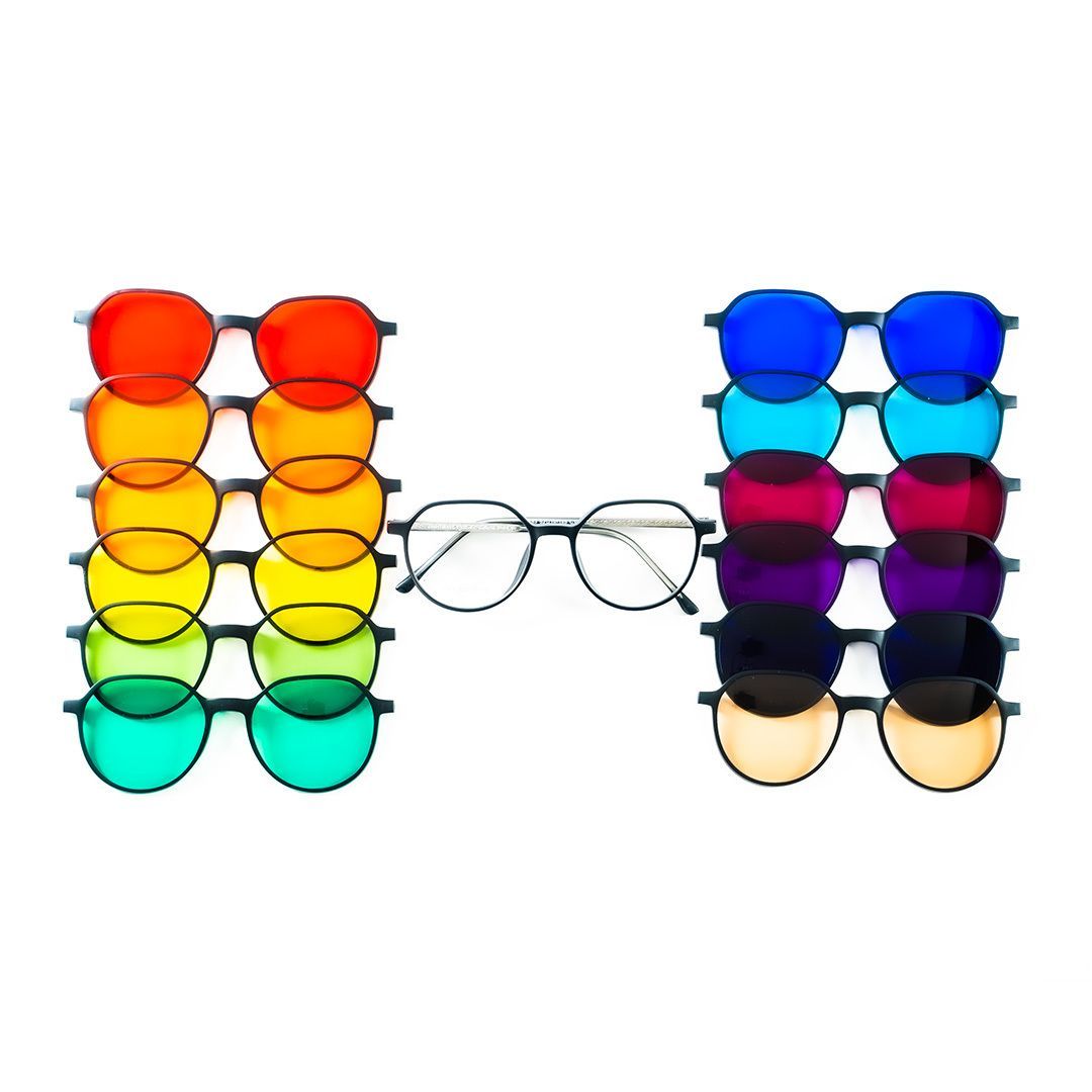 Glasses with interchangeable colored lenses, arranged in stacks.