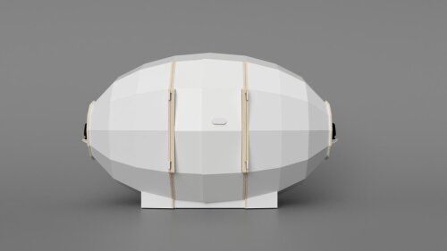 A white object is sitting on top of a gray surface.