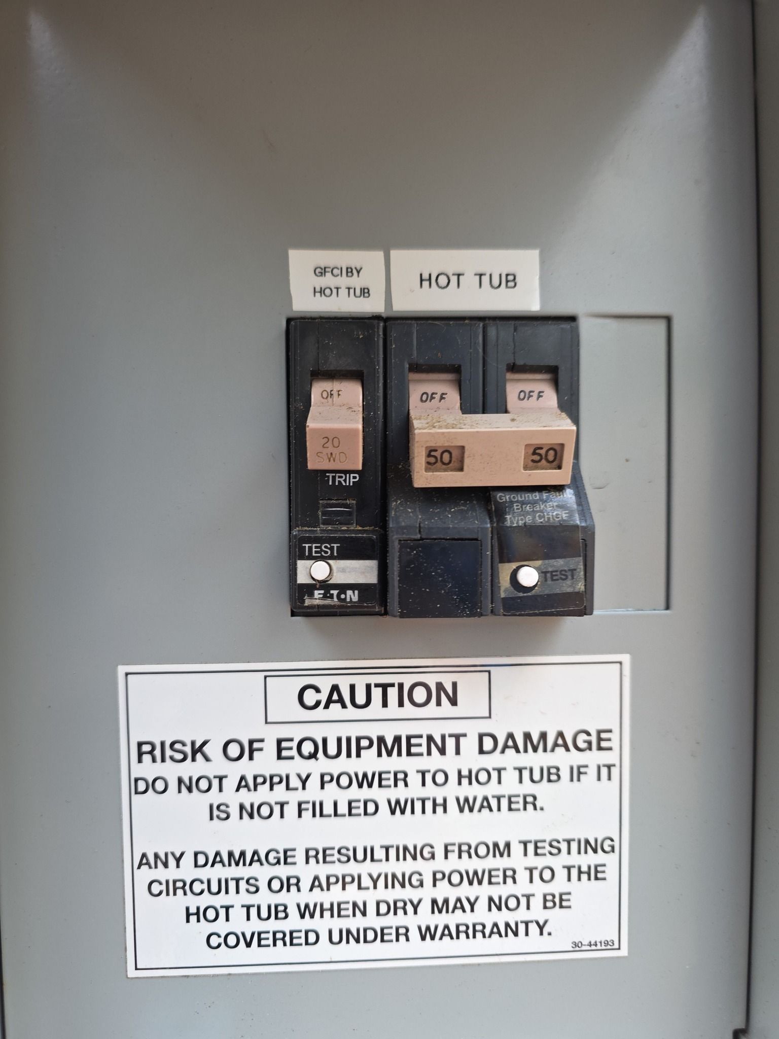 Electrical panel with circuit breakers labeled 