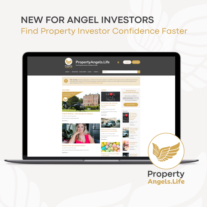 A laptop computer is open to a website called property angels life.