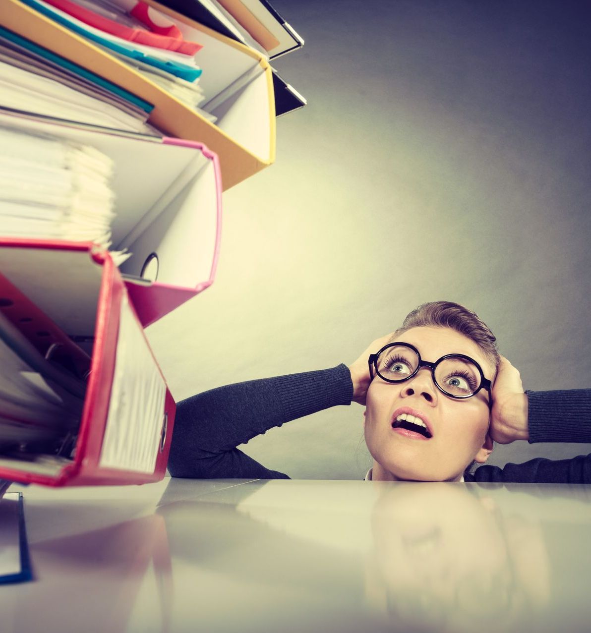 A Person Is Using a Calculator at A Desk — Adding Value CFO Pty Ltd in Larrakeyah, NT