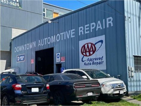 Vehicles in front of our auto repair shop | Downtown Automotive