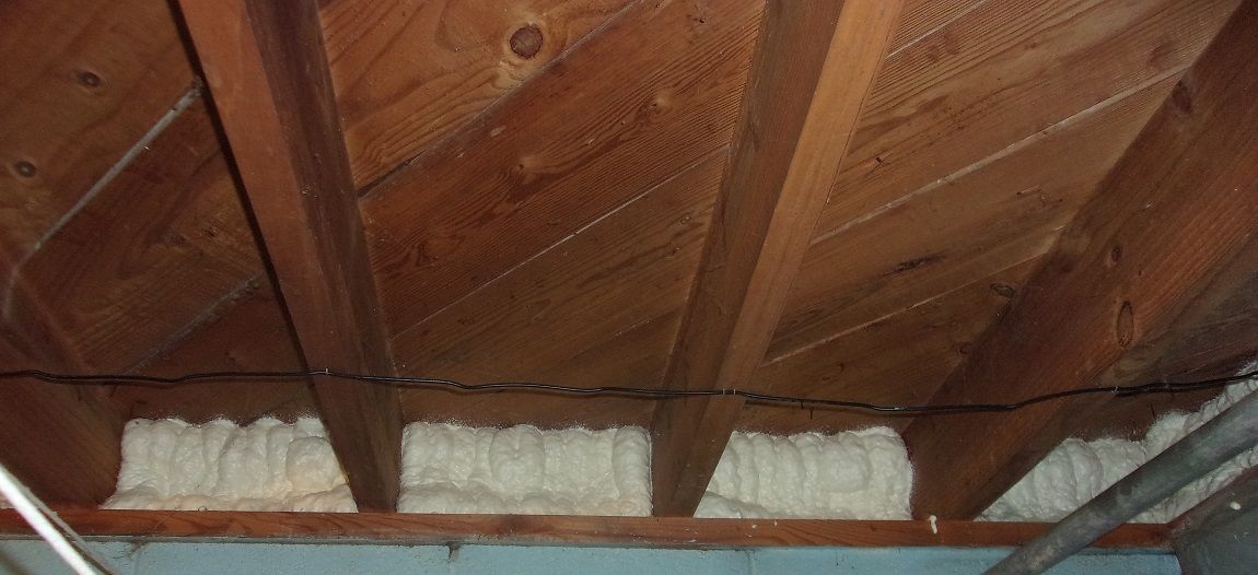 Basement insulation with spray foam on the rim joists, one of the more vulnerable areas of the basement