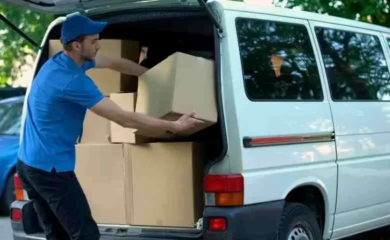 Team of expert long distance movers in Massachusetts loading a truck