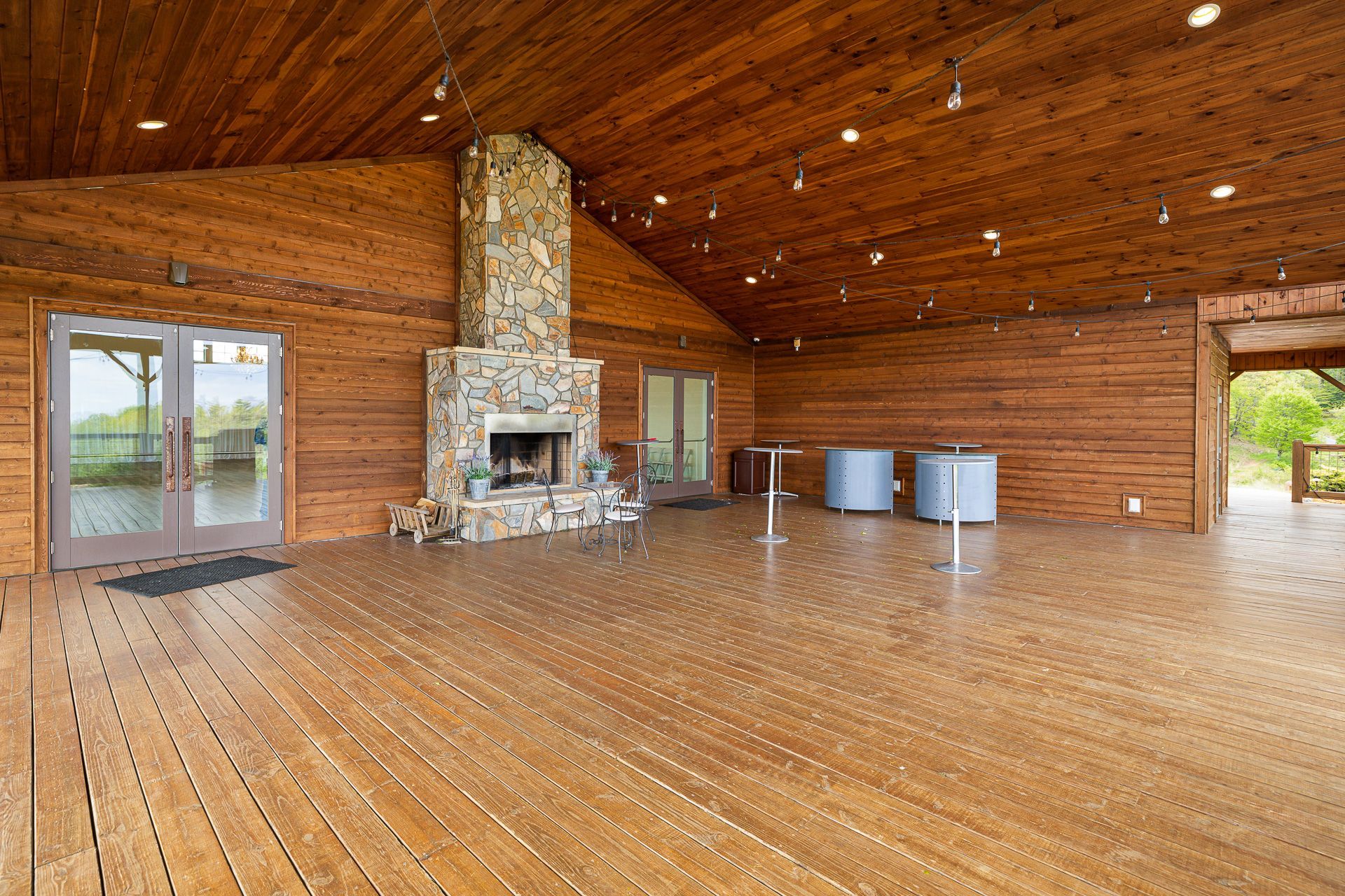 There is a fireplace in the middle of the room.