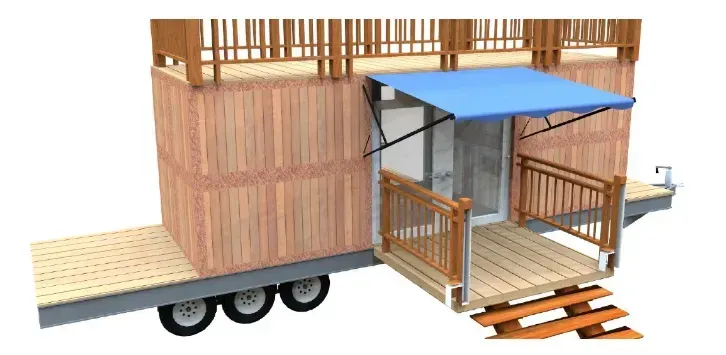 A wooden trailer with a blue awning on top of it.