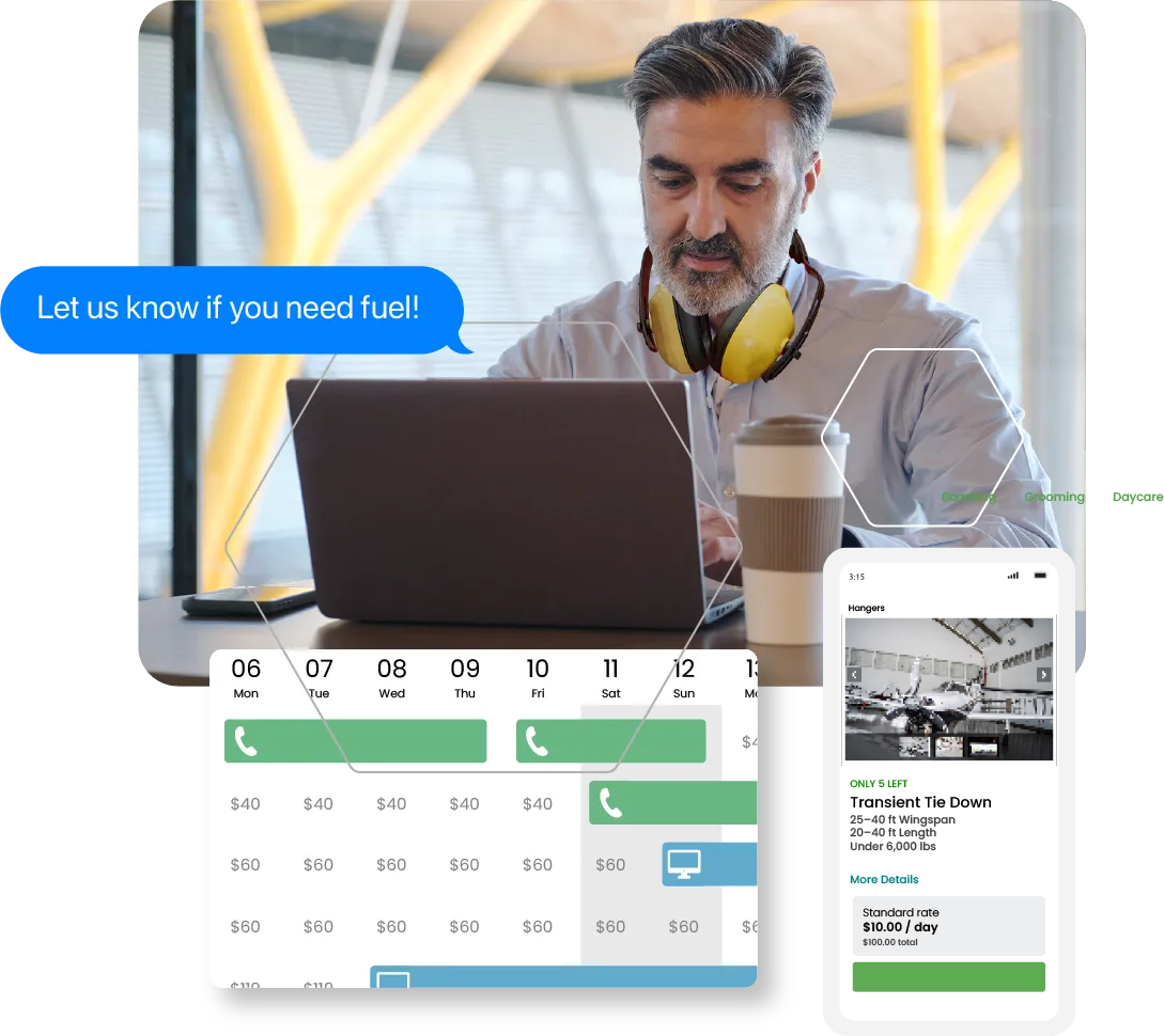 A man is sitting at a desk with a laptop and a cup of coffee.