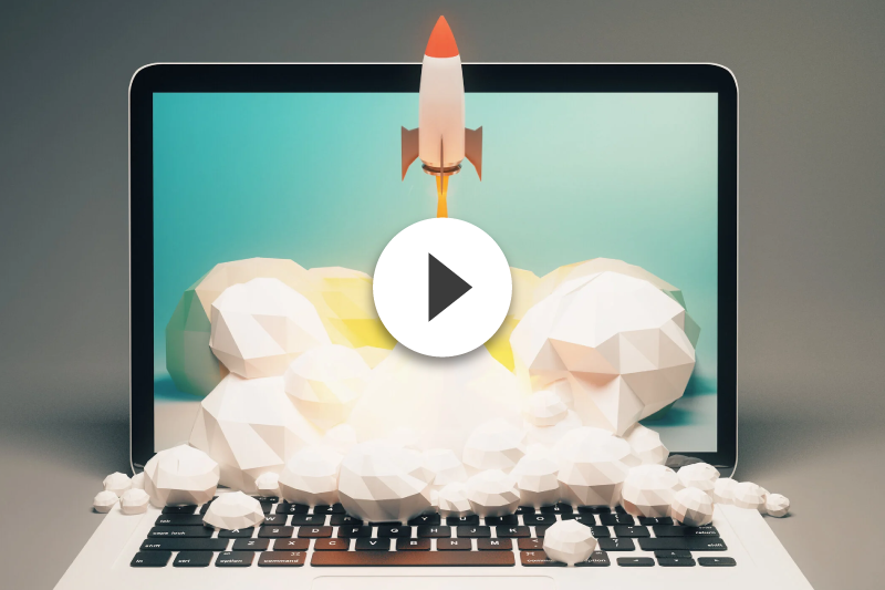 A laptop with a rocket coming out of the screen