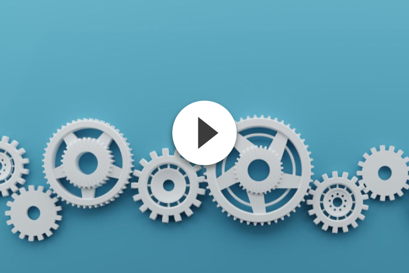 A row of white gears on a blue background with a play button in the middle.