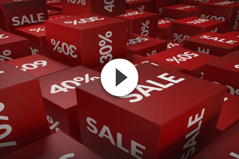 A bunch of red cubes with the word sale on them