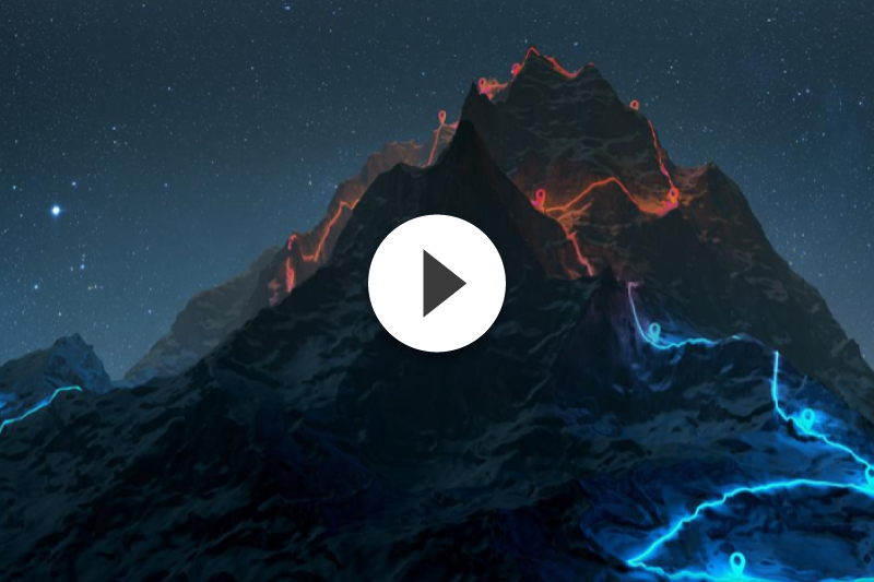 A mountain with lights going up it. 