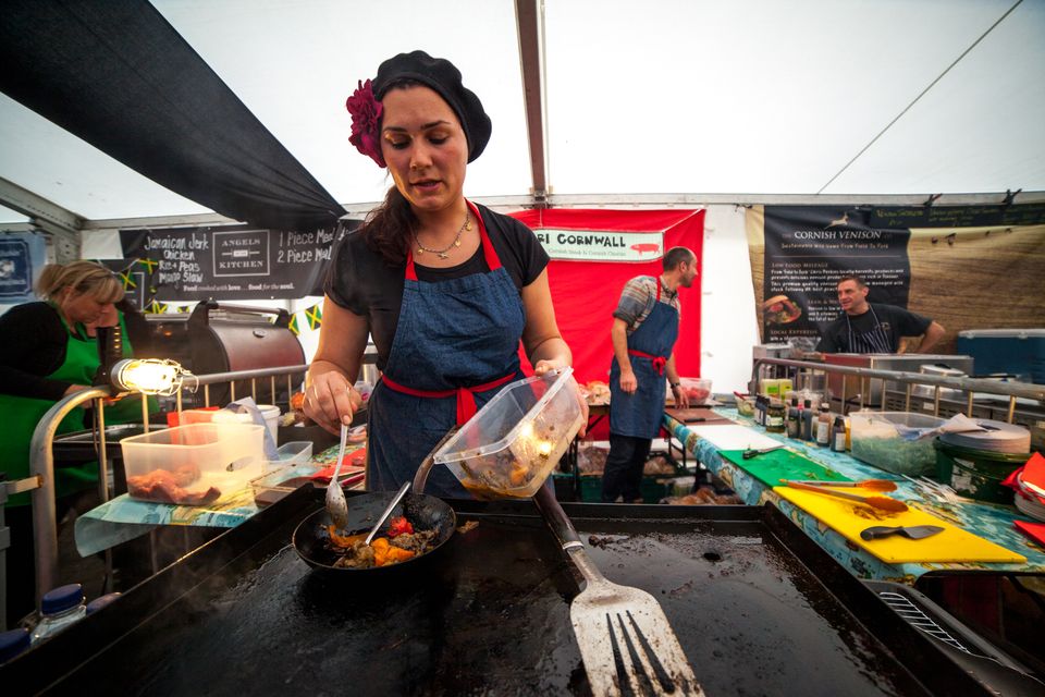 Charlotte Jackman-Bloom freshly cooks one of the vegetarian dishes at Truro Street food festival, Truro, Cornwall. [DATE]Charlotte Jackman-Bloom freshly cooks one of the vegetarian dishes at Truro Street food festival, Truro, Cornwall. [DATE]