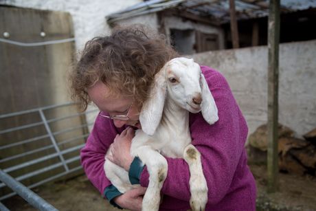 Sue Smith playing with her kids at her home in Coverack Bridges, Cornwall. April 2015.