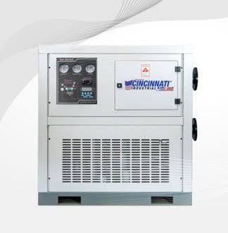 Máquina industrial blanca con indicadores y el logotipo de Cincinnati.