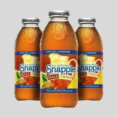 Three bottles of snapple half and half iced tea and lemonade