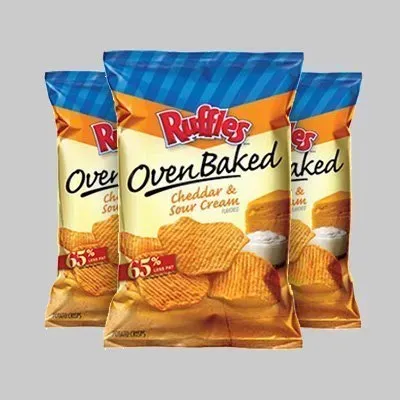 Three bags of ruffles oven baked chips in cheddar and sour cream flavors.