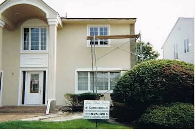 Two Story Home with Scaffolding