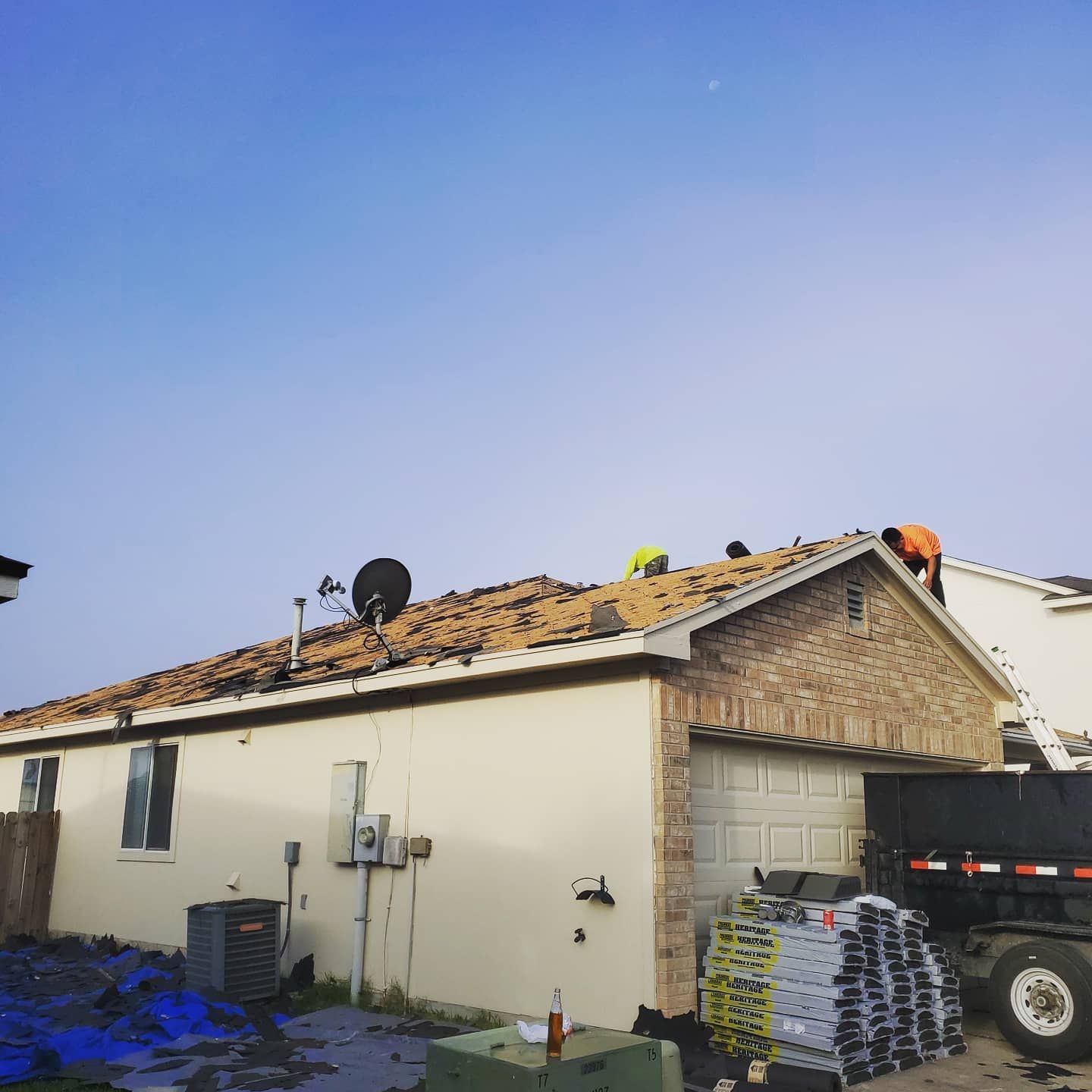 A house with a satellite dish on the roof