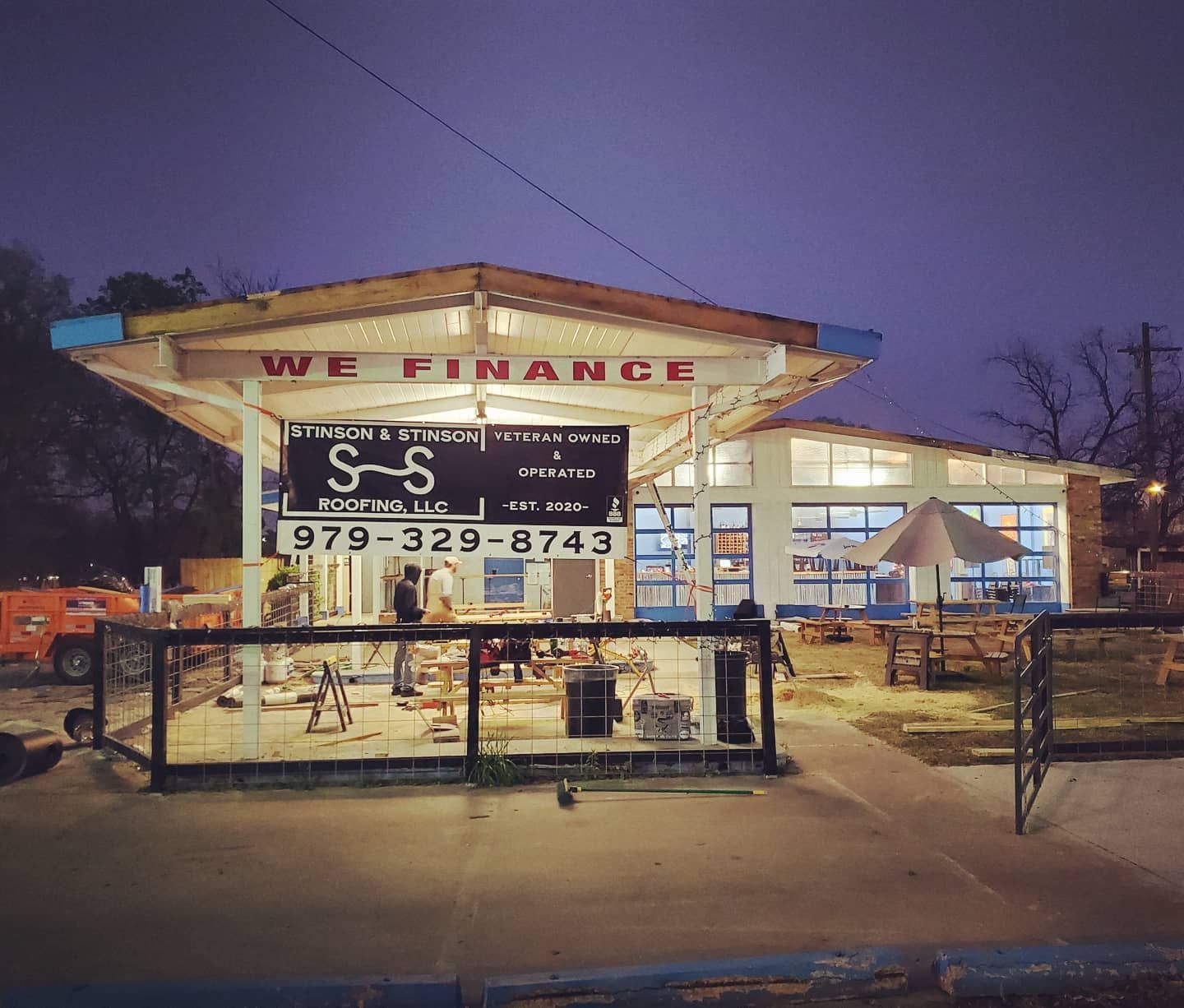 A building with a sign that says we finance