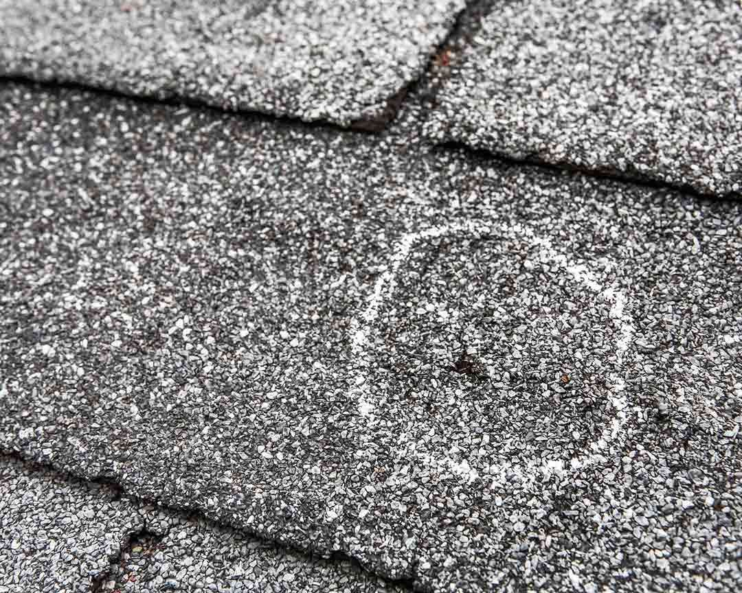 A close up of a roof with a circle drawn on it.