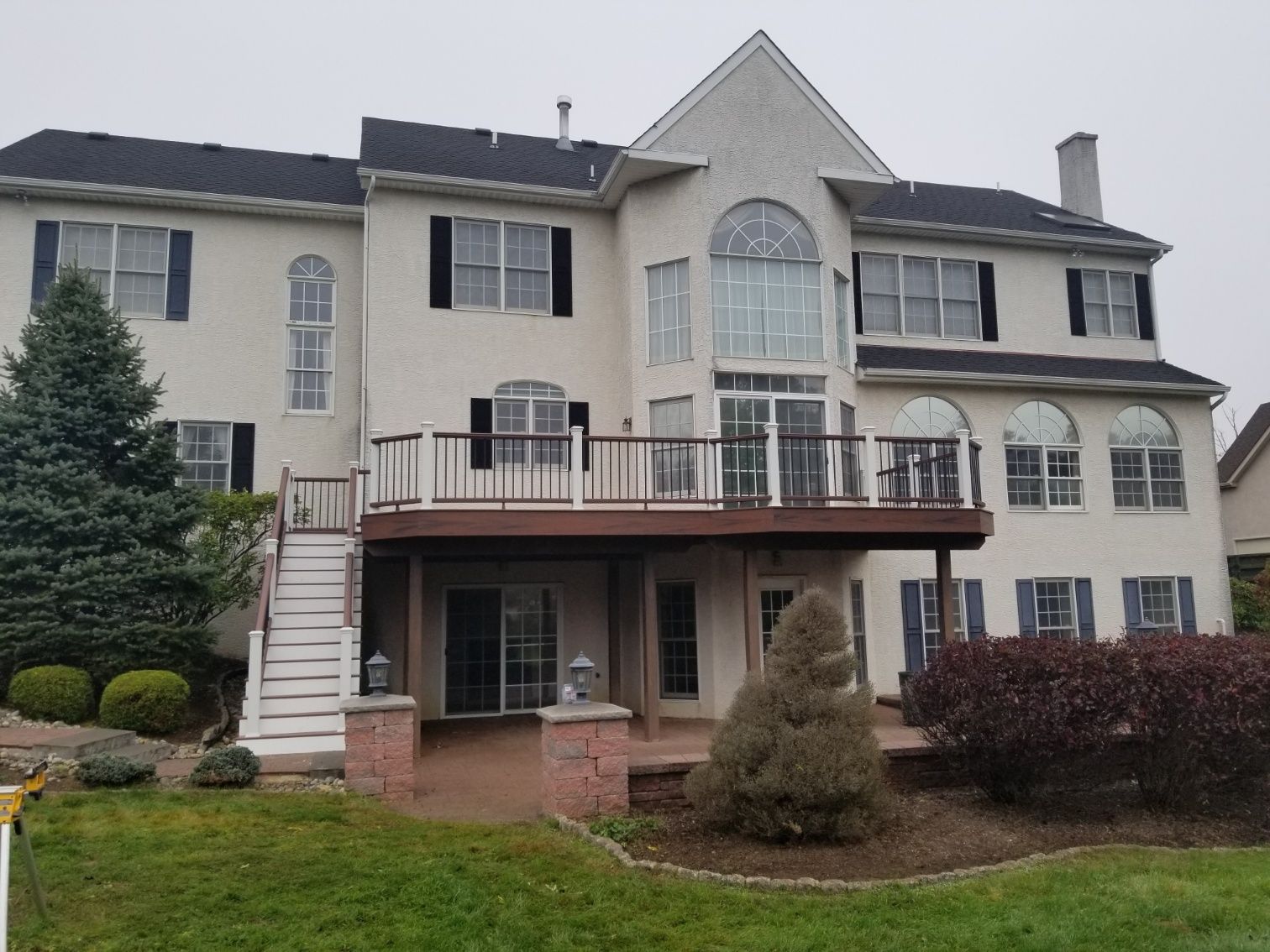 Second floor deck in front large beautiful house